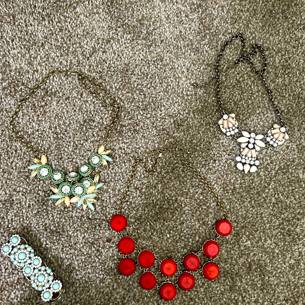 3 necklaces and 1 bracelet. Each is $5